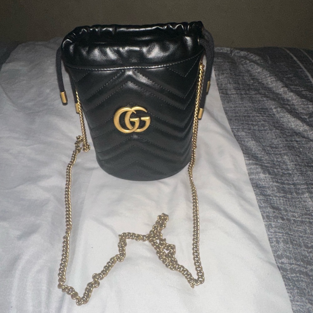 Black Leather Bucket Bag with Gold Chain